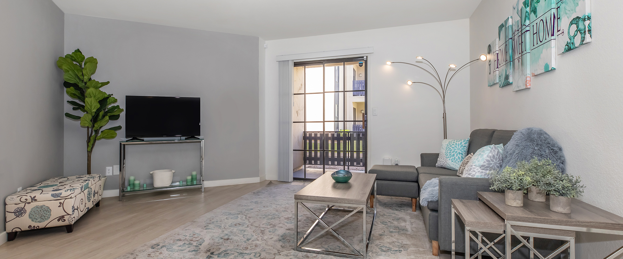 Apartments in Phoenix - Monaco31 Apartments Modern, Open Kitchen with Stainless Appliances, Tile Backsplash, and Ample Counter Space