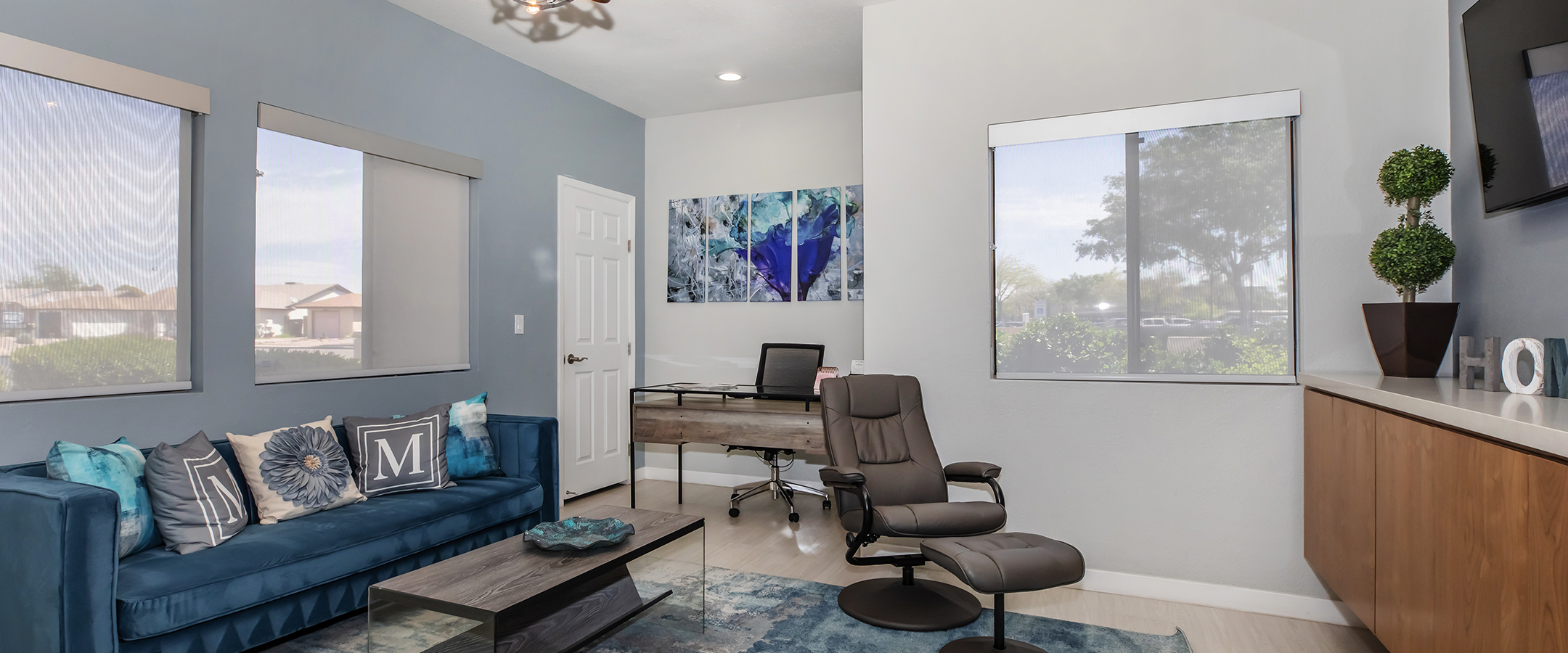 One Bedroom Apartments in Phoenix, AZ - Monaco31 Apartments Bedroom with Wood-Style Flooring and Large Windows